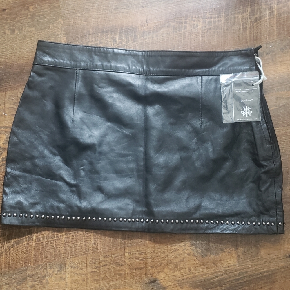 Studded leather mini skirt